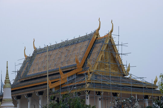 Ornate Temple Roof with Traditional Golden Architectural Details