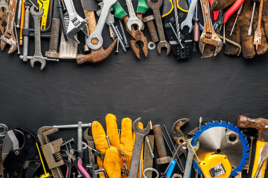 Group of worn work tools. Collection of used blue collar work equipment. For home improvement, diy repair projects, manual labor jobs, Father's day gift ideas, or to celebrate Labor Day.