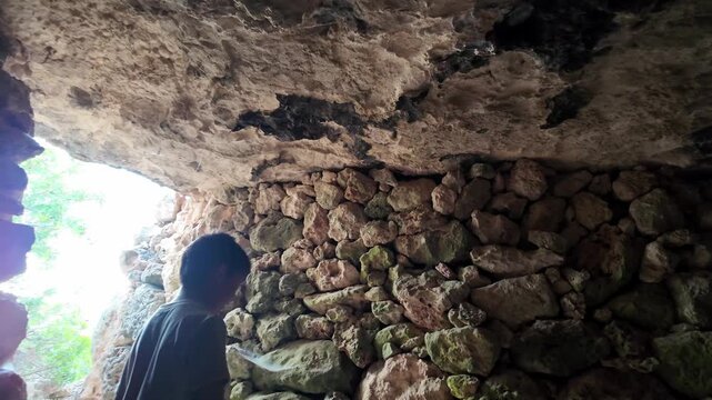 Malta, Xemxija Heritage trail, Punic caves interior, small opening and celling.