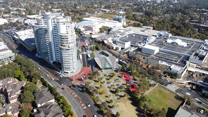 Obraz premium Aerial view of metro station and park below new apartments in Sydney Australia 