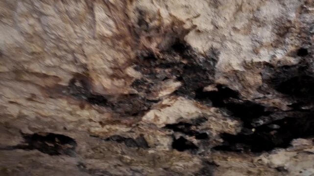 Malta, Xemxija Heritage trail, Punic caves interior. Holes in the ceiling used to tie something.