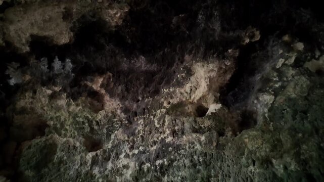 Malta, Xemxija Heritage trail, Punic caves interior. Holes in the walls used as shelfs and to tie animals.