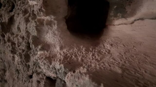 Malta, Xemxija Heritage trail, Punic caves. look into holes in the cave walls and celling