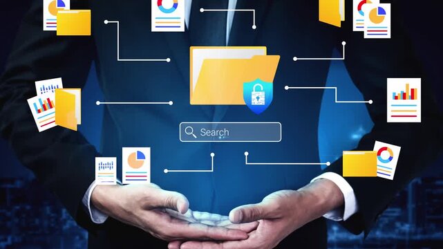 Businessman Holding Data Management System with Graphic Icons for Secure File Sharing and Information Protection in Financial Technology Environment Gluon.