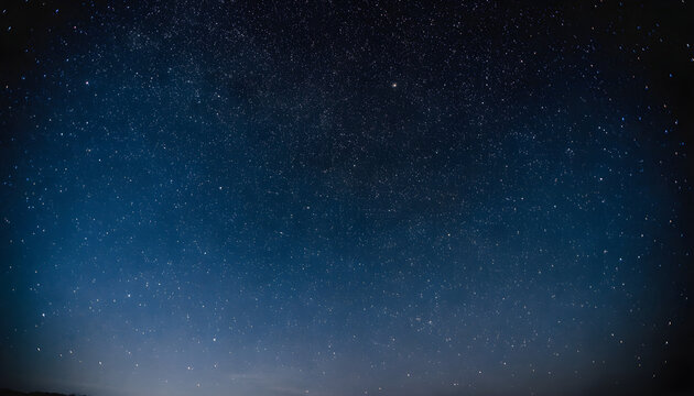 A night sky with stars and a boat