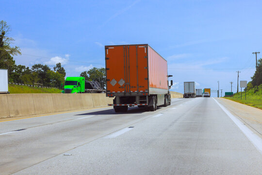 Trucks travel on American interstate highway