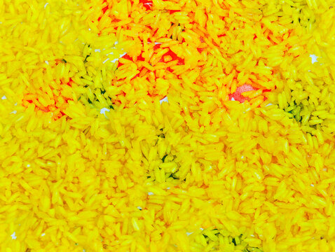Full Frame Background of Yellow Turmeric Rice Grains