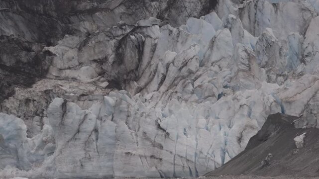 a close up shot of the terminus face of lamplugh glacier at glacier bay, alaska of the united states