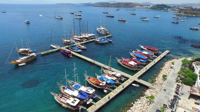 Bodrum Marina Turkey aerial view with yachts and boats on Aegean sea waterfront harbor.