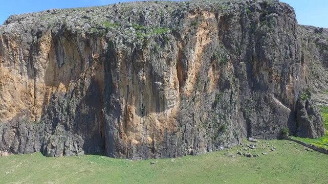 Aerial Anazarbus Castle Turkey ruins mesa summit sheer cliffs fortress walls travel heritage detail.