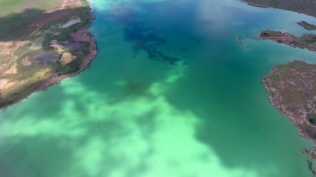 Turquoise water and open shoreline at Todurge Lake Sivas Turkey show freshwater scenery.