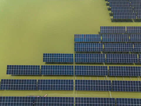 Aerial view of the Sirajganj 68MW Solar Park with rows of floating solar panels on the water surface Sirajganj, Rajshahi Division, Bangladesh.