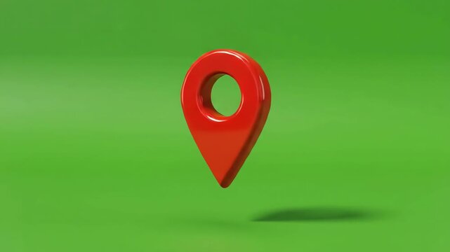 3D red location pin icon bouncing and rotating on a bright green screen background for chroma key compositing