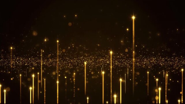 黒背景に金色の光が下から上へ舞い上がるビデオ