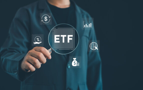 ETF investment concept showing a financial professional analyzing market performance, investment returns, portfolio data and asset trends through digital technology and financial research.