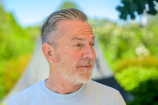 Senior Man Looking Sideways Outdoors