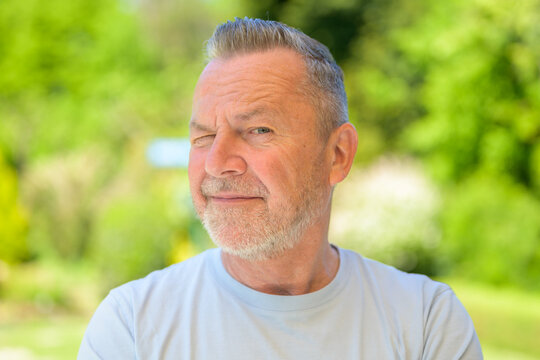 Senior Man Winking Outdoor Portrait
