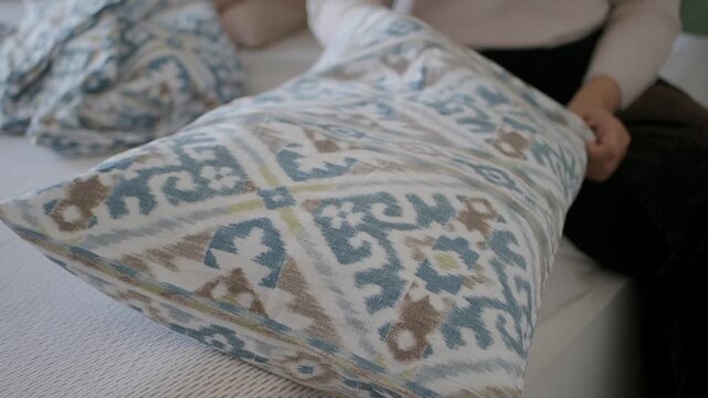 Pillow stuffing activity in home setting