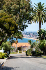 Fototapeta premium Palos Verdes Estates home with ocean view and palm trees