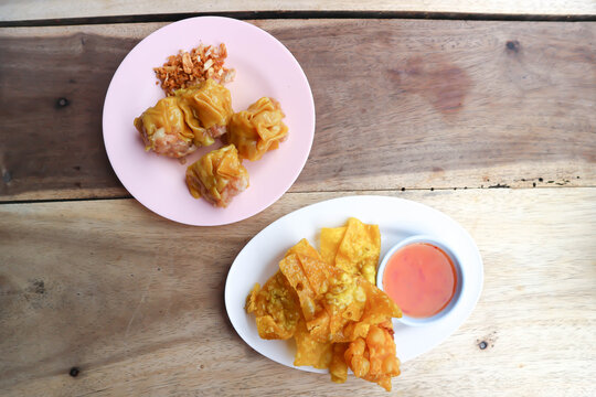 fried wonton, deep fried wonton or fried dumpling or deep fried dumpling and Chinese steamed dumpling or dim sum or steamed dumpling