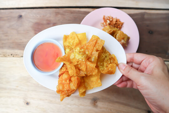 fried wonton, deep fried wonton or fried dumpling or deep fried dumpling and dip