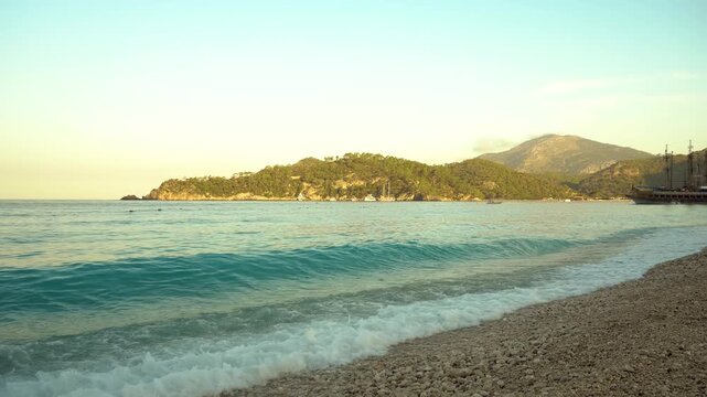 Tropical Beach at Sunrise with Gentle Waves