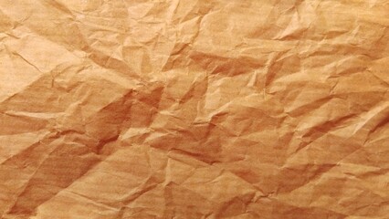 Fototapeta premium Brown crumpled craft paper background, crumpled paper texture