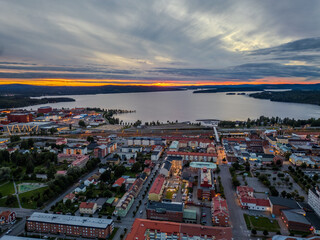 Fototapeta premium Sunset at a lake and a town in Sweden