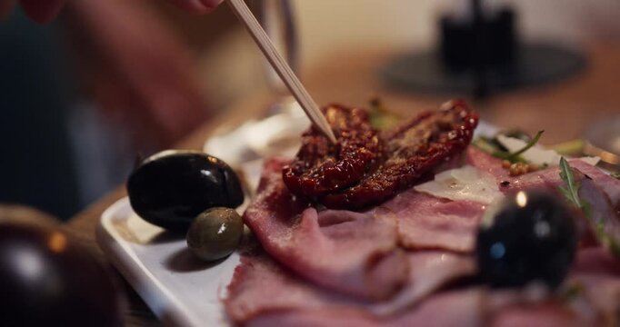 Gourmet Antipasto Platter with Ham and Olives Close-up