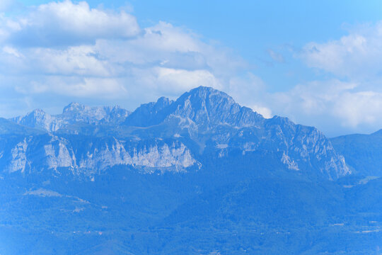 Majestic Swiss Alps Peak Rising Under a Bright Blue Sky Near Morges