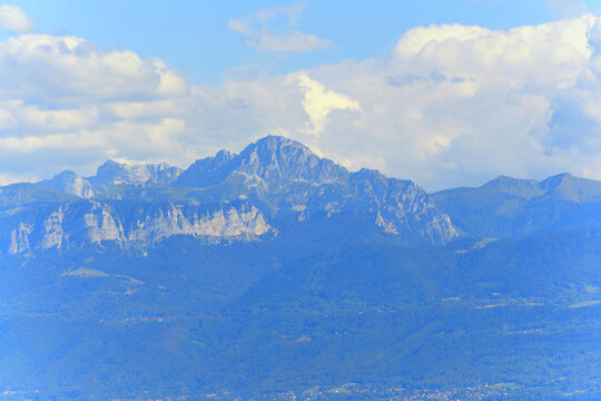 Beautiful View of the Alpine Mountains Under Cloudy Sky from Morges