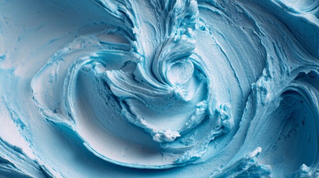 Close up of creamy blue ice cream with smooth swirled texture, soft frozen dessert background, rich creamy scoop with vibrant blue color and delicious sweet treat appearance