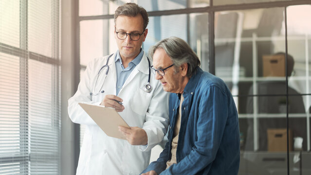 Talking to a patient during a consultation