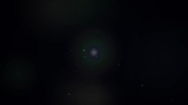 Glowing light orbs floating across a dark background in a seamless looping animation