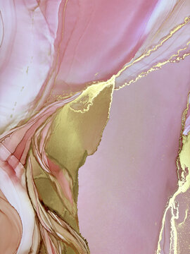 Abstract handmade not AI royalty free flud pink aquarelle or marble background with gold. Beautiful alcohol ink watercolor artwork. Backdrop texture or interior poster resembles natural pink stone.