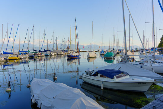 Morges, Switzerland - August 6, 2026: Peaceful Marina with Sailboats on Lake Geneva in Morges Switzerland
