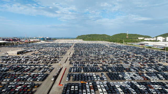 Aerial view new car lined up, Automobile automotive car parking lot commercial business industry,  Port of import export business logistic dealership, New cars global business logistic import export.