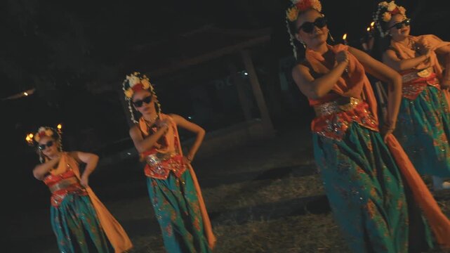 Group of Five Javanese Dancers in Modern Fusion Attire Posing at Night