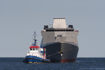  SHIPBUILDING INDUSTRY - The multipurpose frigate after being launched, returns to the shipyard accompanied by tugboat © Wojciech Wrzesień