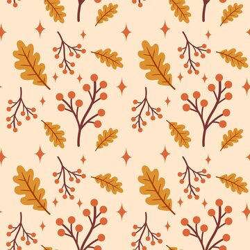Seamless pattern of orange oak leaves, red berry branches, and stars on a warm cream background