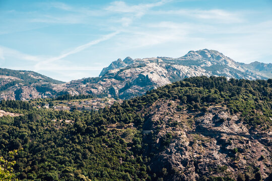 Breathtaking landscape of rocks and forest in the mountains of Corsica