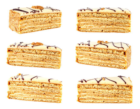 Six Slices Of Layered Cake With Brown Layers White Cream Icing and Walnut Decorations On Transparent Background