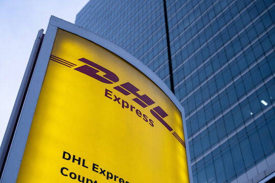 Bangkok, Thailand. August 14th 2026.DHL Express brand logo sign of the multinational logistics and delivery courier company outside an office in Bangkok, Thailand, Asia,