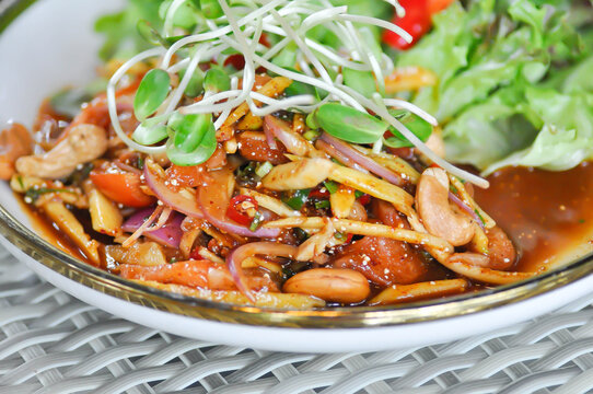 salmon salad, spicy salmon salad or spicy salad or spicy seafood salad with cashew and sunflower sprout