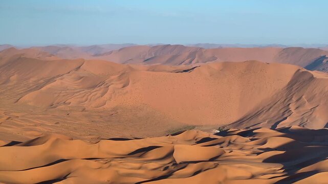 Golden Sand Dunes with Dramatic Shadows in Badain Jaran Desert, China