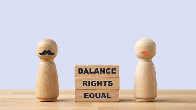 Gender Equality Concept with Balanced Wooden Figures and Equal Rights Message