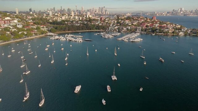 Aerial drone view of the harbour side suburb of Point Piper in East Sydney, NSW, Australia with Sydney City in the background on a sunny morning in August 2026 