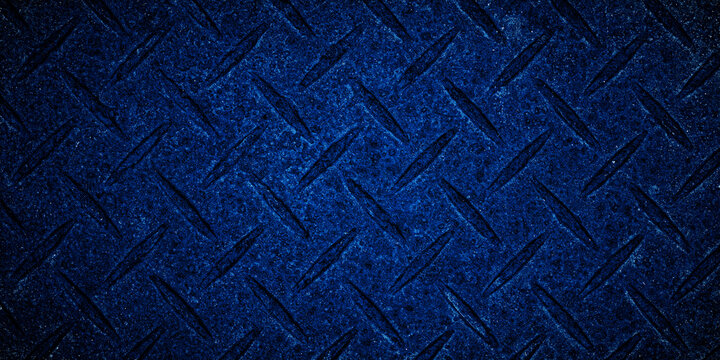 Blue diamond plate metal texture background with grunge industrial surface and raised tread pattern. Useful for construction, safety, factory, wallpaper, and design projects.