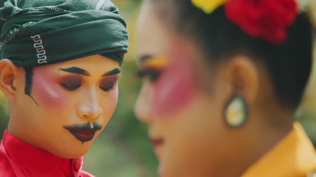 Close-Up of Male Traditional Dancer Looking Down Solemnly