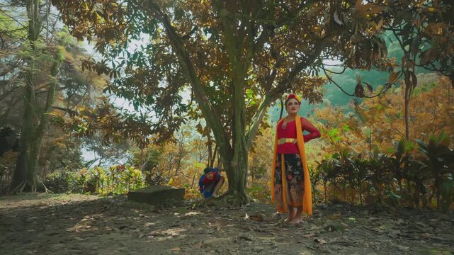 Playful Scene of Javanese Dancers Under Large Tree